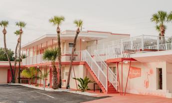 The exterior of The Local motel building