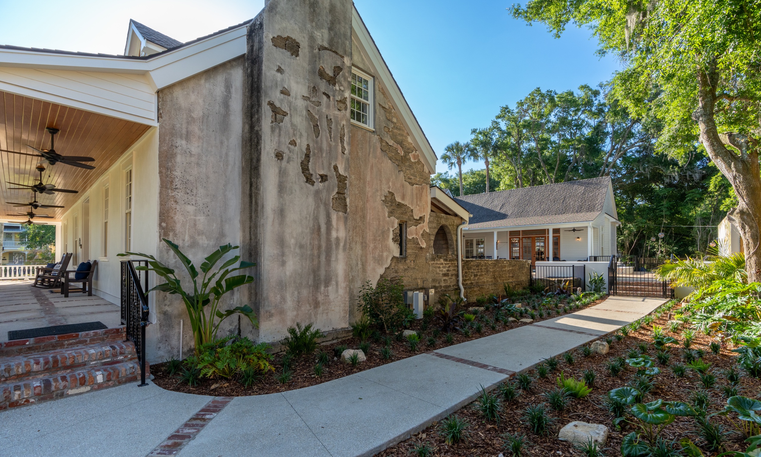The exterior of a restored building in Lincolnville shows the original coquina wall