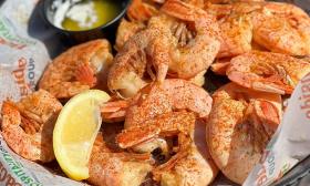 A platter of locally-caught Peel-and-Eat Shrimp steamed with Old Bay seasoning 