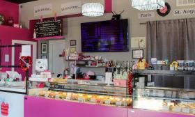 The main counter at Le Macaron, a French pastry shop on Cathedral Place in downtown St. Augustine, FL