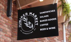 The exterior sign for Juniper Market