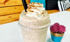 A protein shake topped with whipped cream 