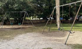 The sets of swings on the property