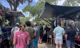 An assortment of food trucks are parked at the Taste of St. Augustine