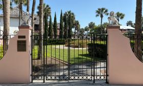 The gates leading into the Isabella Gardens