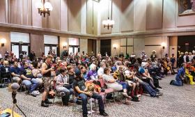 An audience at Ancient City Con listens to a panel discussion.