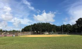 A baseball diamond is on the property with plenty of play space