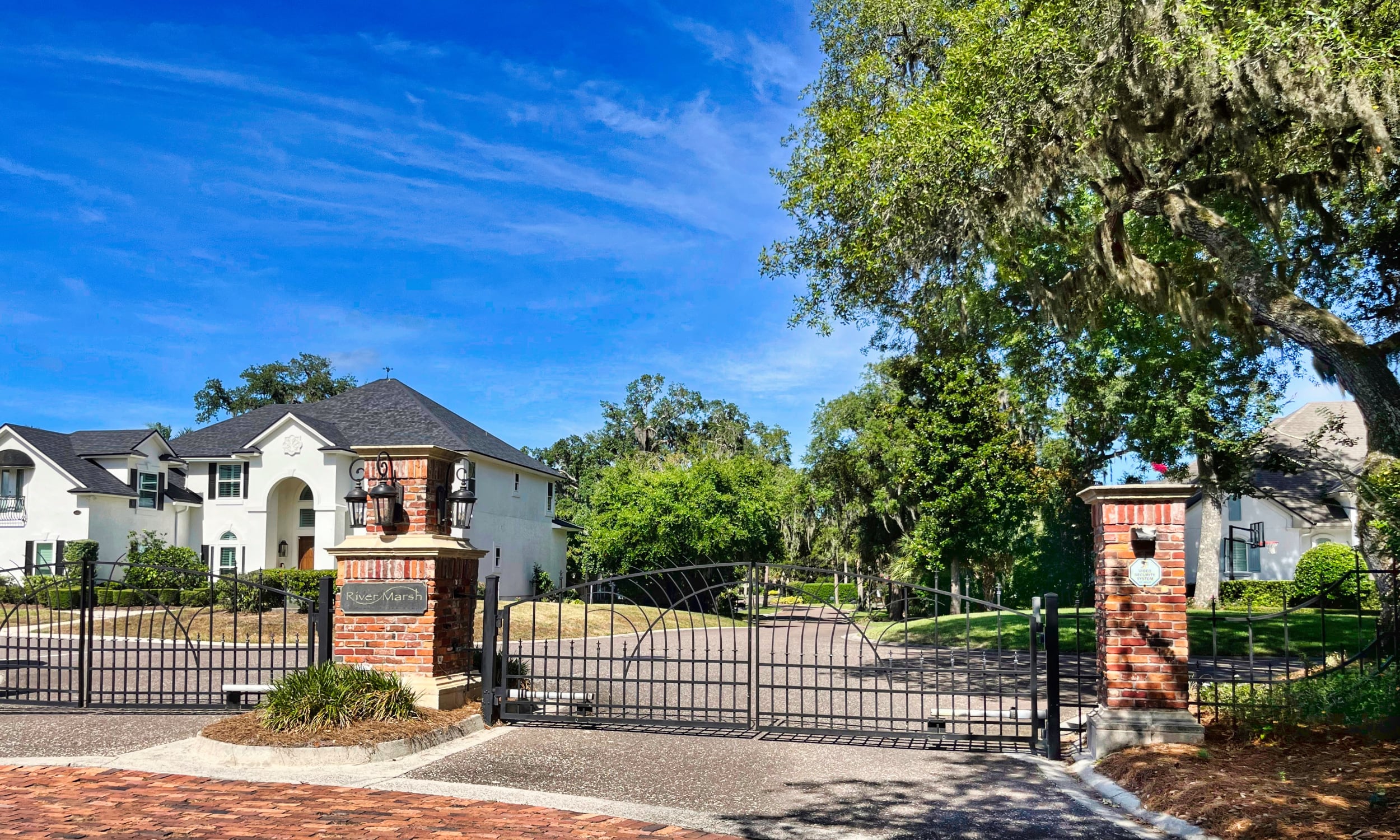 View of a gated Palm Valley neighborhood