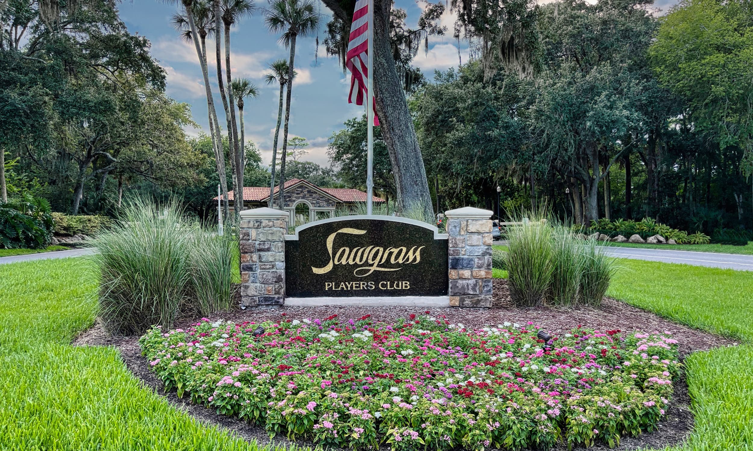TPC Sawgrass sign at the entrance of the gate