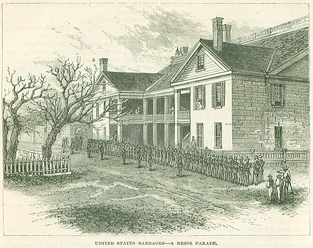 A black and white illustration of the Saint Francis Barracks in St. Augustine, Florida. It is a three story building with a recessed courtyard. On the sandy street in front of the barracks, a troop of soldiers line up for a dress parade. Tourists / local civilians look on in the foreground.