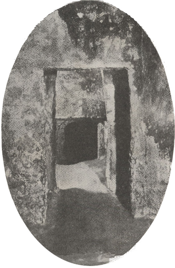 A black and white photograph with an ovular frame of the coquina entranceway to the powder magazine at the Castillo de San Marcos in St. Augustine, Florida.