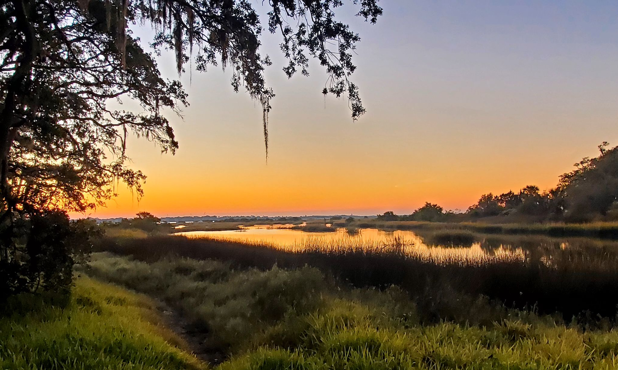 Sunrise over Shore Drive Park and waterway