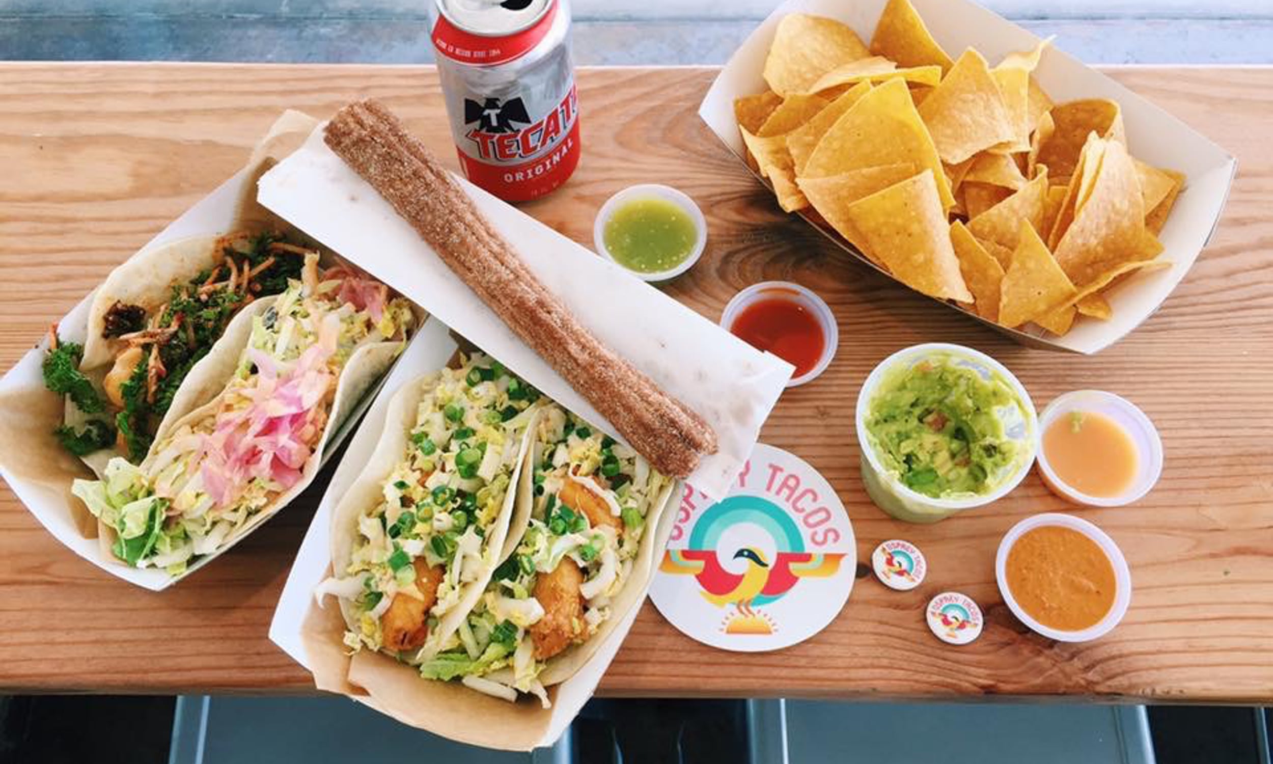 Chips, salsa, tacos, a churro, and beer from Osprey Tacos on Anastasia Island
