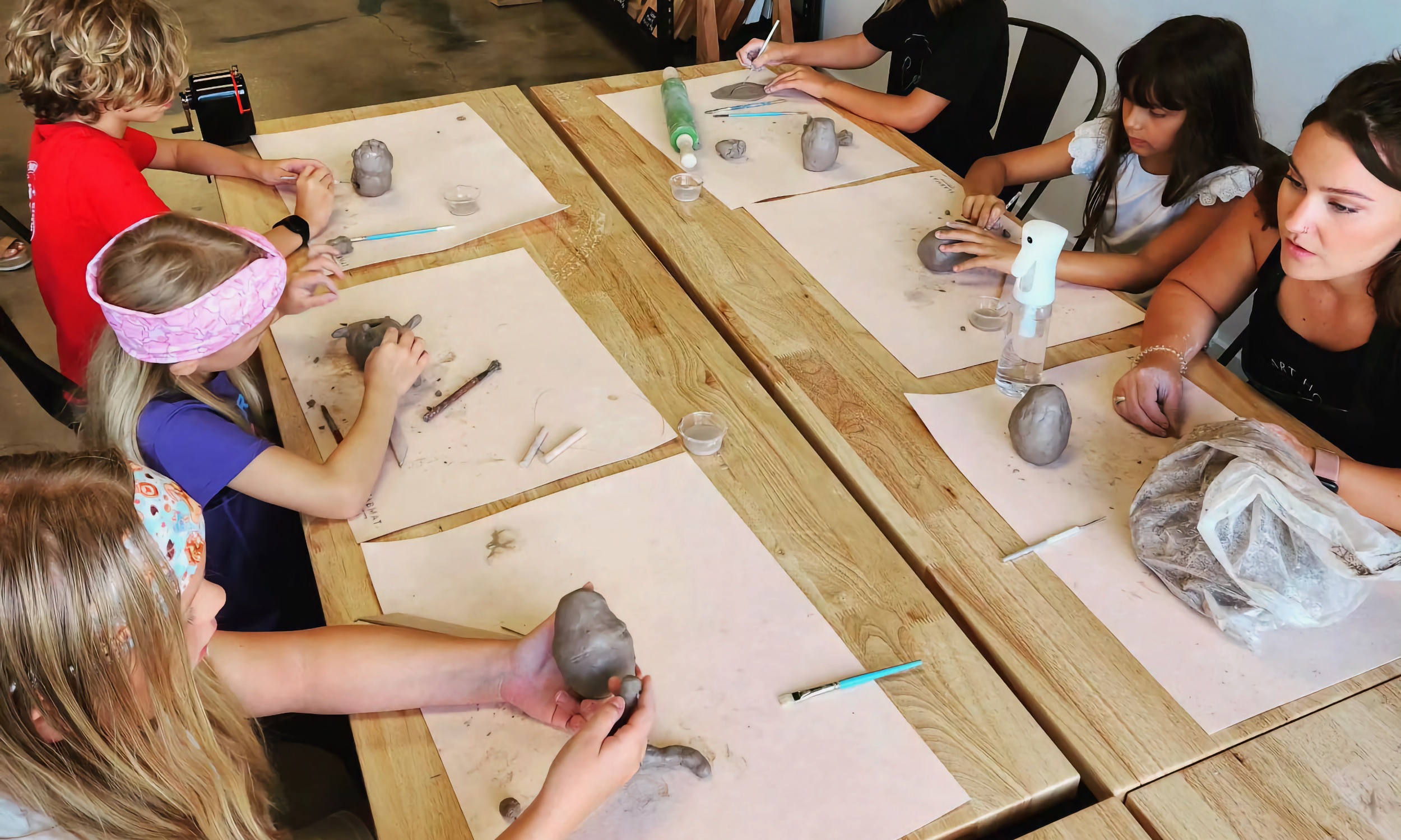 Children working with clay at The Art House