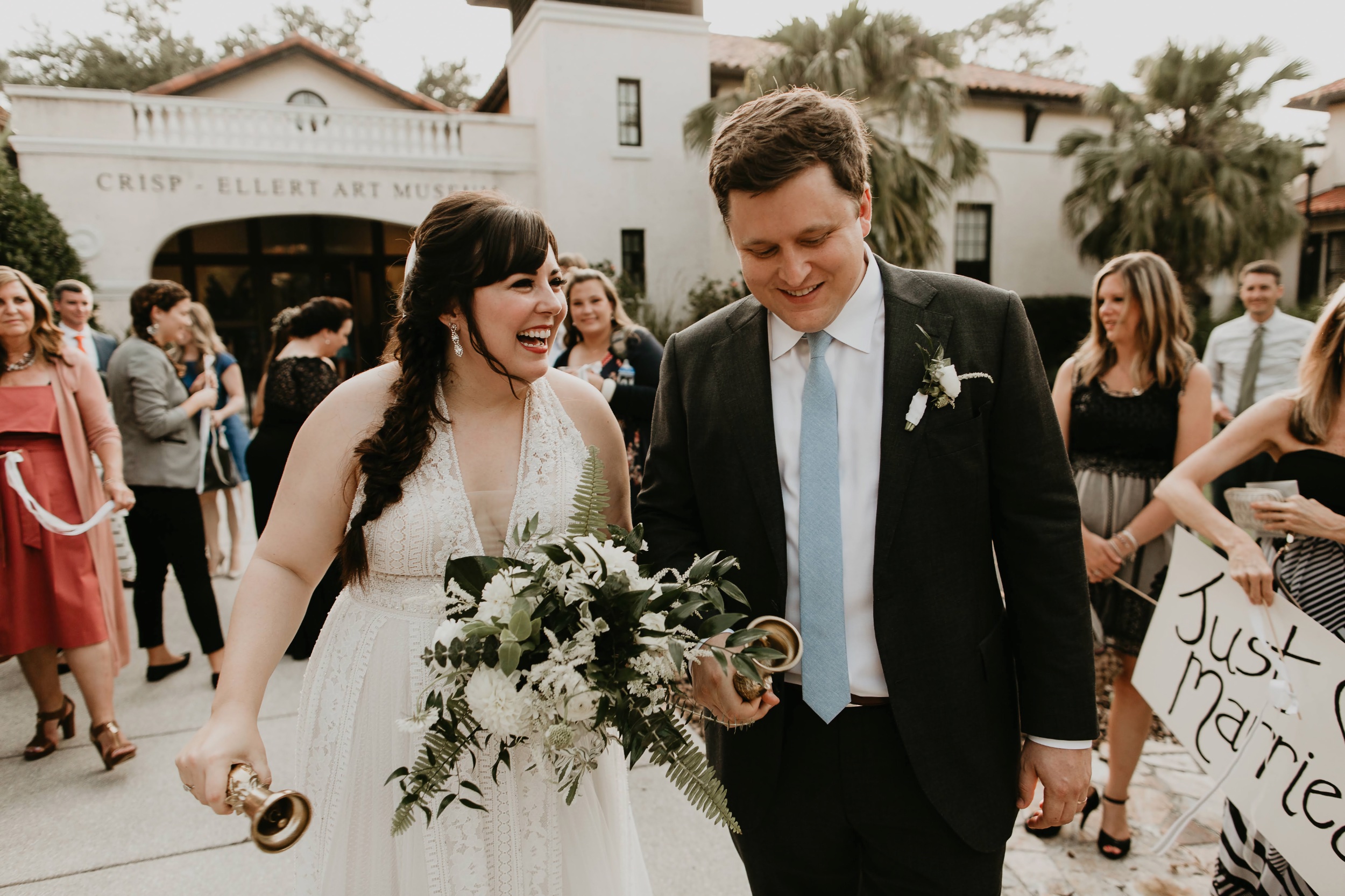 Newly-weds walking out of the Crisp-Ellert Art Museum