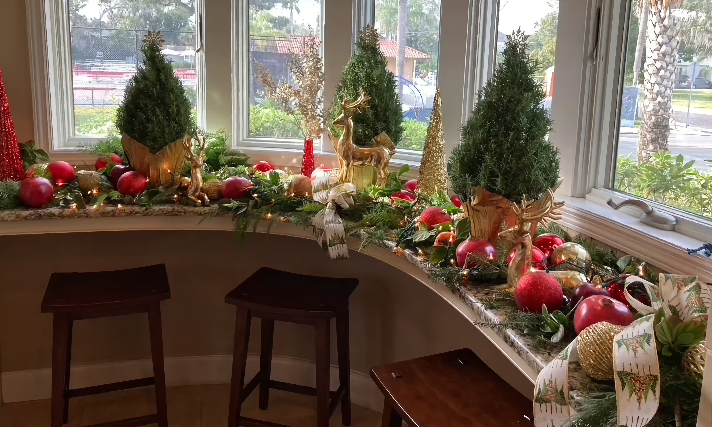 A window counter decorated for Christmas by the St. Augsutine Garden Club