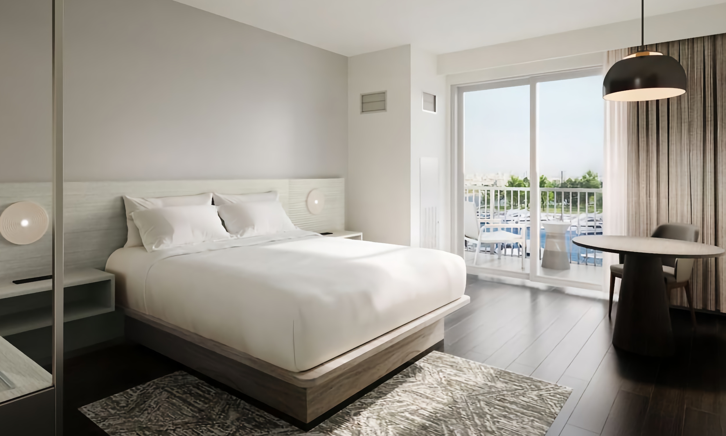A king hotel room with a water view