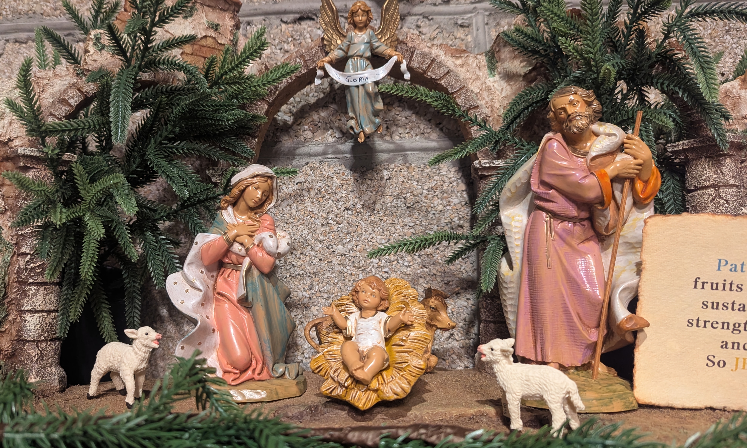 A section of a painted ceramic nativity from Italy, showing the Holy Family