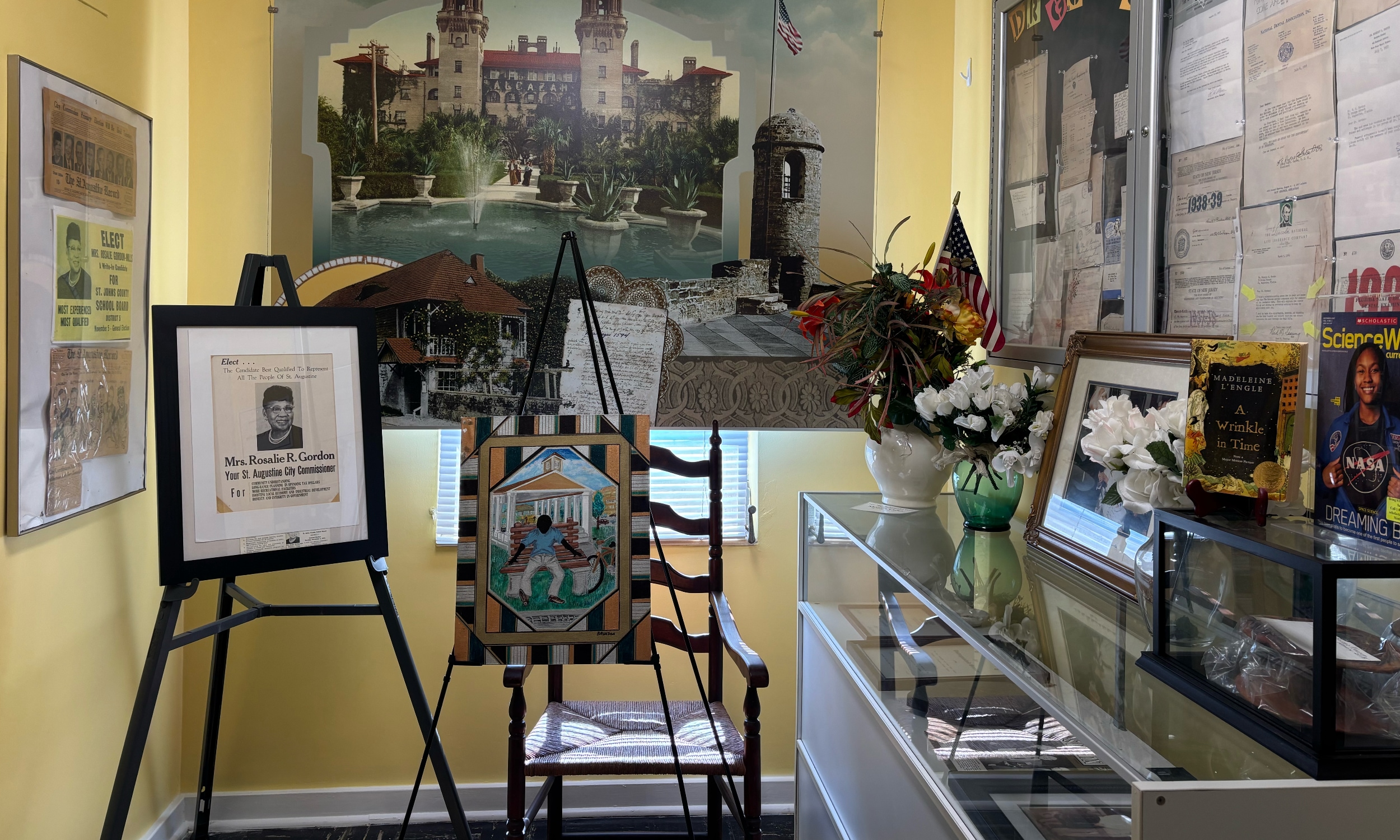 The yellow room in the Accord Civil Rights Museum with photos and art