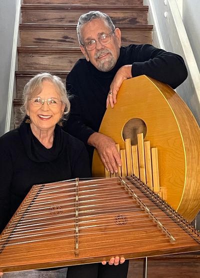 The husband and wife duo, Heart Strings, with their wood instruments