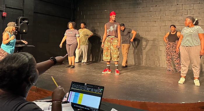 The cast of Once on This Island in rehearsal