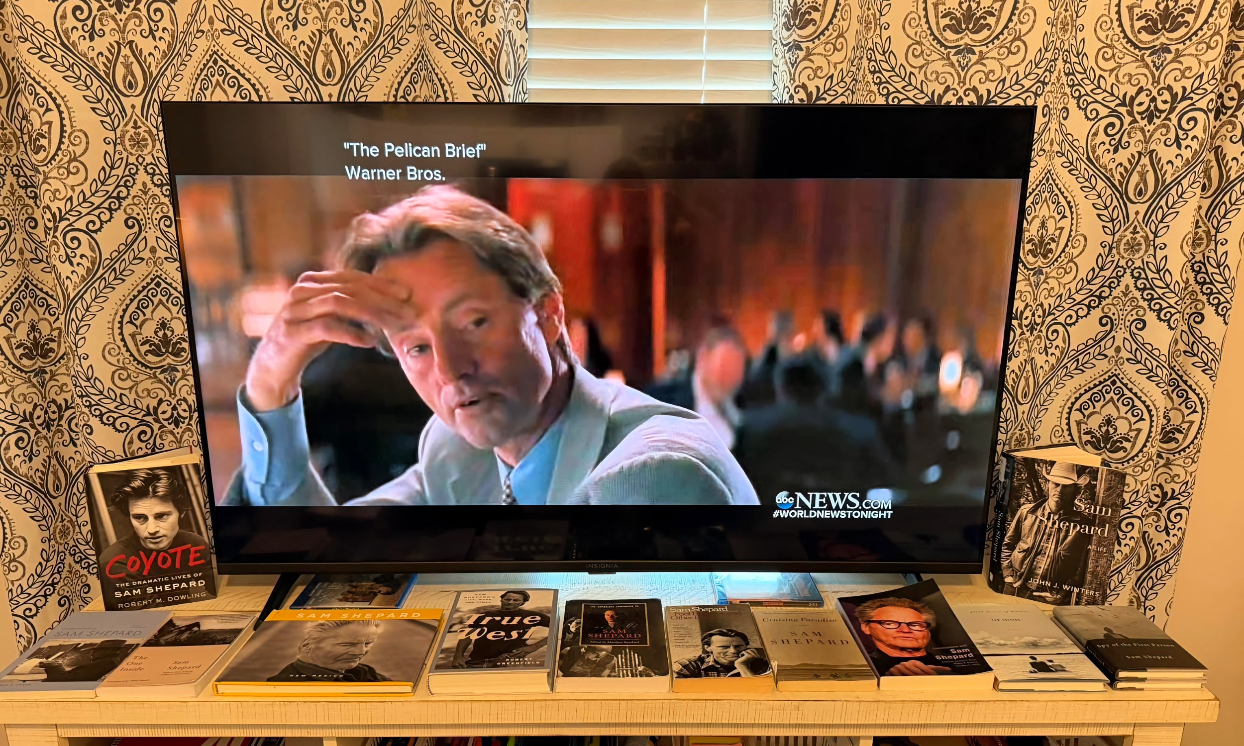 A table-top display of items associated with the works of Sam Shepard