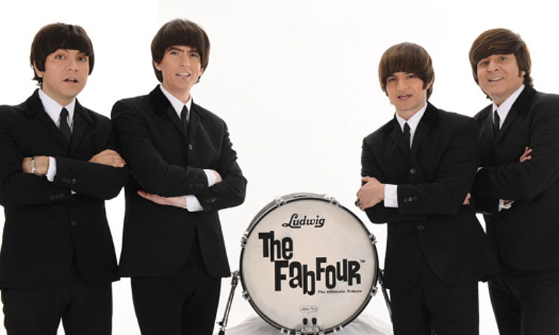fab_four_posing_5x3.jpg