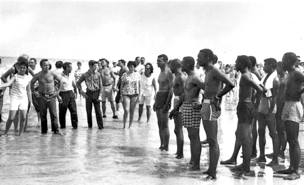 The beaches were a prominent arena for Civil Rights demonstrations in the segregated South. Here, integrationists and Segregationists gather on Saint Augustine Beach in Saint Augustine, Florida. Image courtesy of Florida Memory.