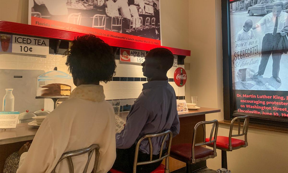 Two mannequins sit at a section of the historic Woolworth counter from the St. Augustine Civil Rights Movement. At the Lincolnville Museum and Cultural Center in St. Augustine, Florida.