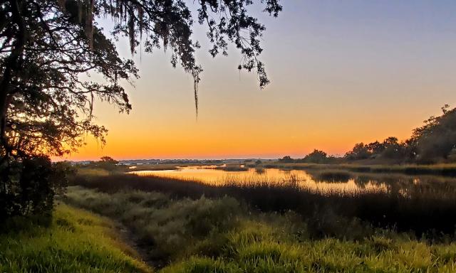 Sunrise over Shore Drive Park and waterway