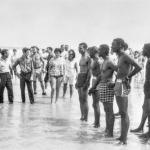 In the ankle deep water of St. Augustine Beach, activists (right) face off with segregationists on June 25 1964.
