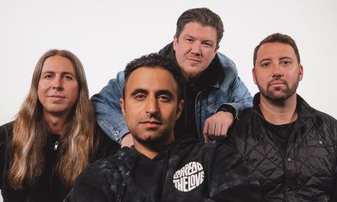 Rebelution bandmates together in a group photo. 