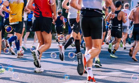 Runners dash towards the finish line. 
