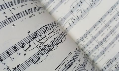 A close up of a musical score for an opera