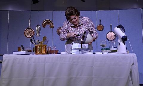Robyn Marie Lamp, soprano, on stage in the comedic role of Julia Child for "Bon Appetit!"
