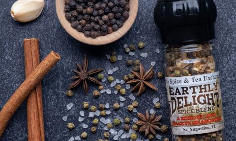 Spices on a table in and a jar from The Spice and Tea Exchange in St. Augustine