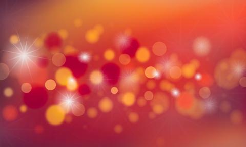 This field of red reflective circles and starts is evocative of the Christmas season