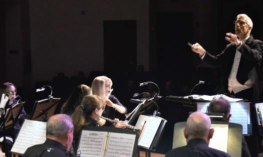 Geoffrey Magnani, musical director and conductor of the Saint Augustine Concert Band, leads the orchestra
