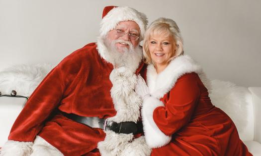 Santa and Mrs. Claus posing