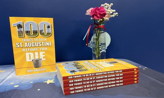 A display of the 100 Things to Do in St. Augustine Before You Die Books