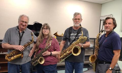 The four members of Sax Pack and their instruments