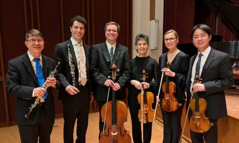 This chamber music ensemble has six members, two woodwind players and two strings