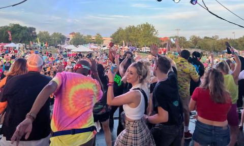 Audience members dancing at the As If! 90's Fest in 2024