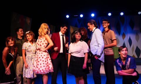Actors on stage at Limelight Theatre