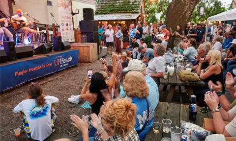 The audience listening to musicians at 2024 St. Augustine Songwriters Festival