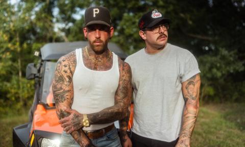 Luke Healy and Jesse Denaro, the duo Lakeview, outside with a four-wheeler