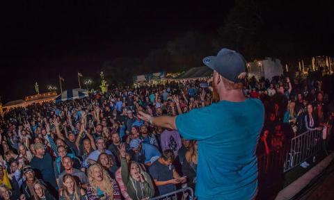 The frontman of Roots of Creation on stage 