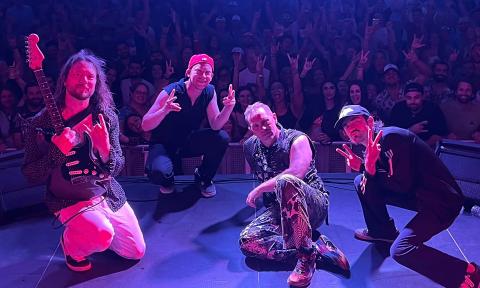 The tribute band, Red Not Chili Peppers taking their signature photo with the audience