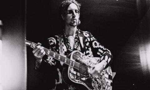 Joseph Arthur performs with his guitar.