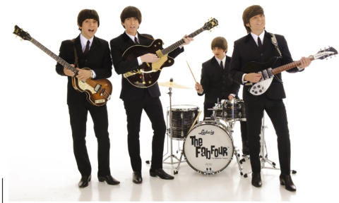 Bandmates from The Fab Four pose in front of a white backdrop.